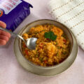 arroz meloso con pollo servir