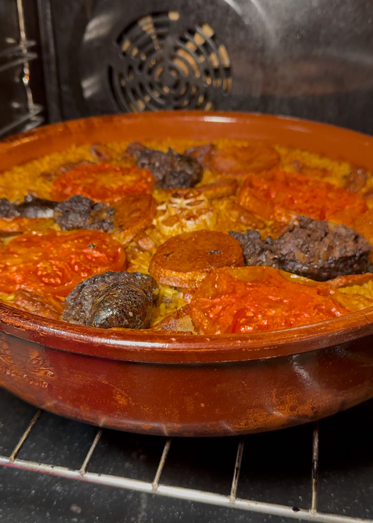 Hornear Arroz al horno con costillas