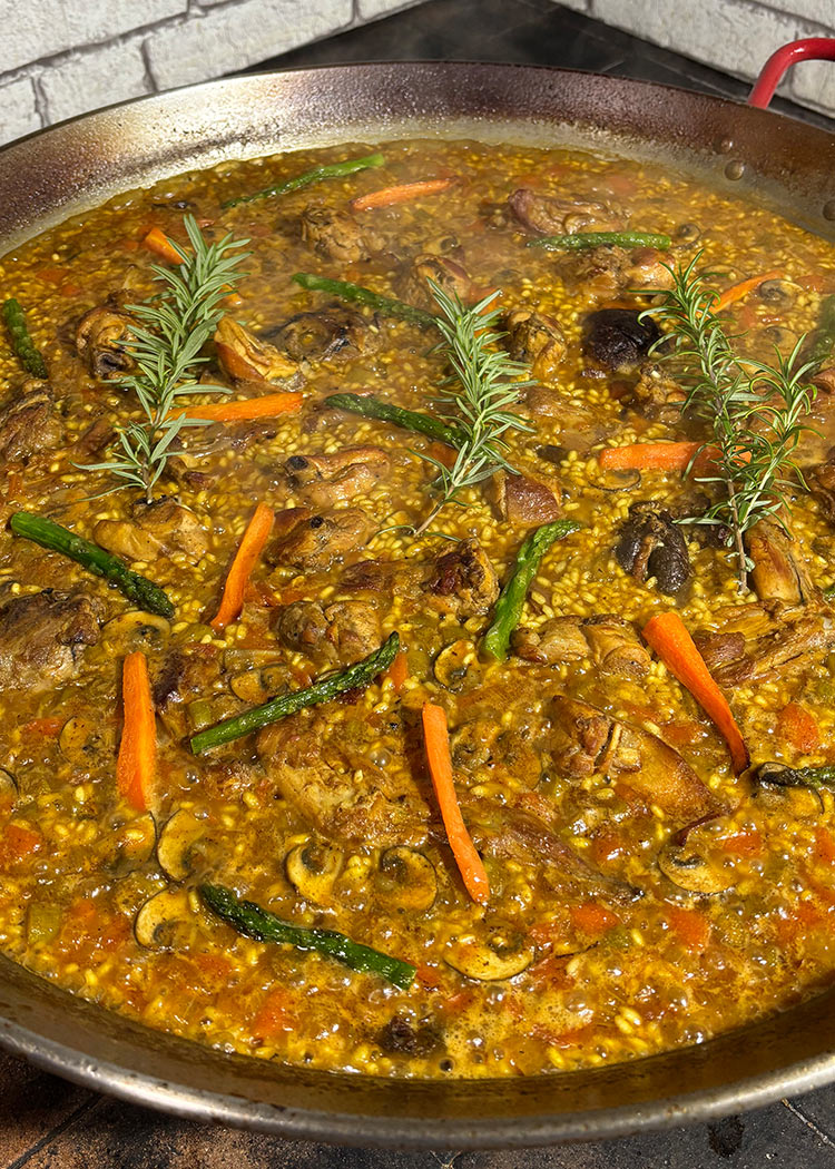 Presentación de Arroz con conejo y verduras